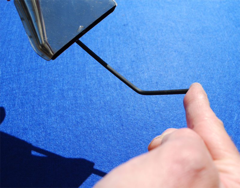 apply heat and bending the tube or tubing boom