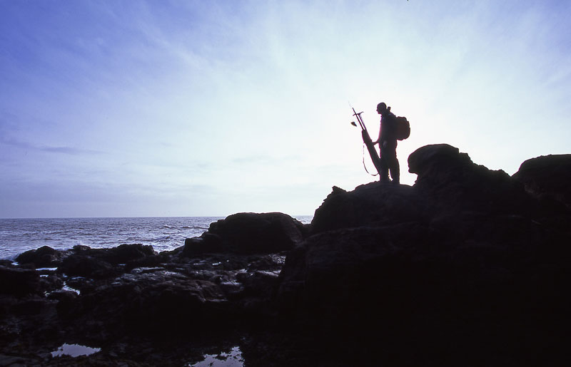 A lone angler surveys his mark
