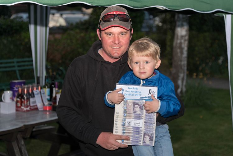 Winner Andy Bunn with son