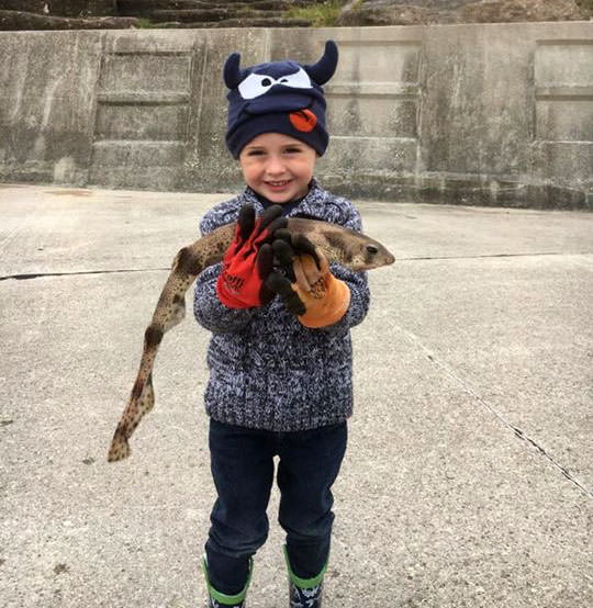 A chuffed Harrison with his dogfish