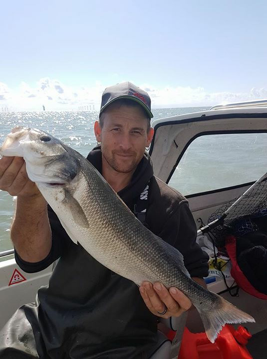 Martyn Smyth with his 6lb bass on a squid bait