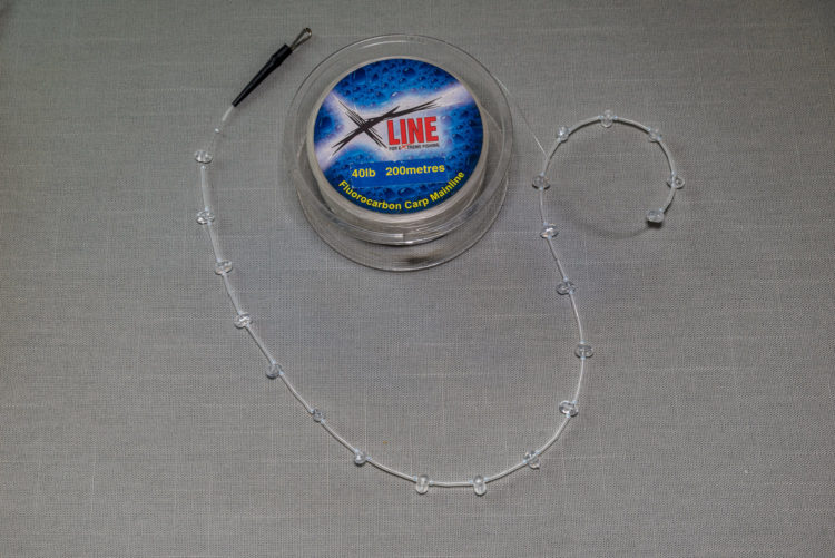 Tubing and two-way beads threaded on trace body