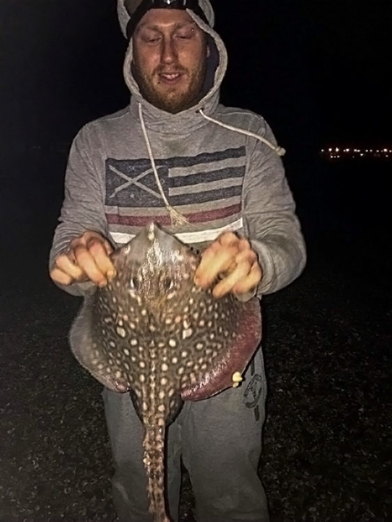 Chris Taylor with one of his catch of rays