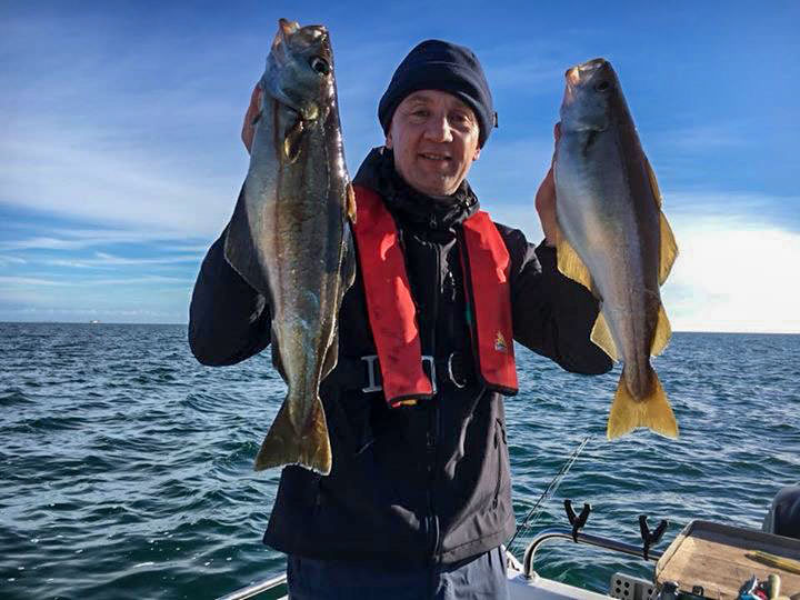 Jonathon Hall with a brace of pollack