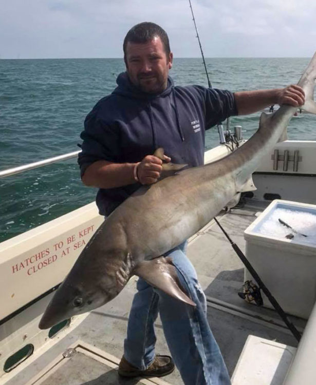 A massive 50lb tope for Adam Tate