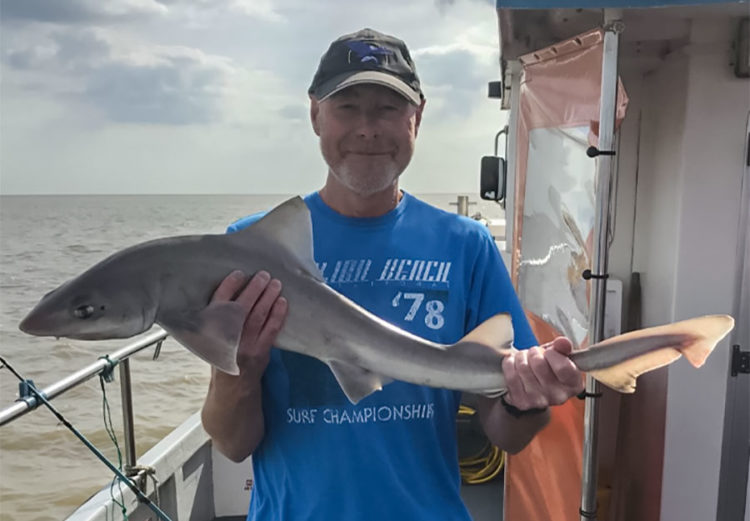 Stuart Wallace with one of his hounds