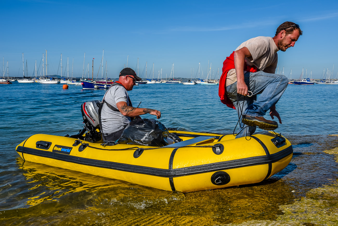 Crewman Mark disembarks from the tender