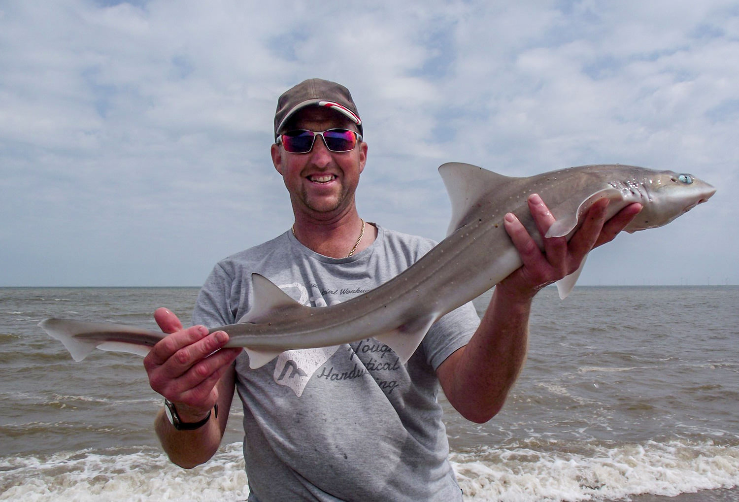 Adie Cooper with one of his hounds