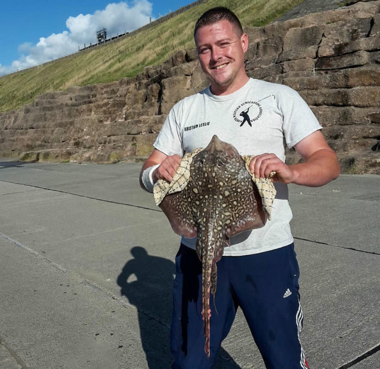 Kristian Lesley with his first ever thornback ray