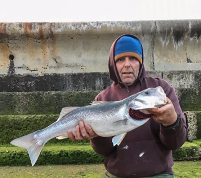 Paddy Stewart with a 8lb 1oz bass, he also landed a 6lb 4oz bass