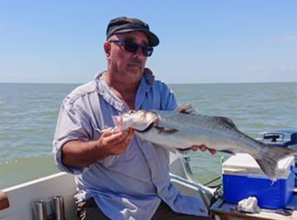 Alan Tipple with a 5lb bass from his own boat