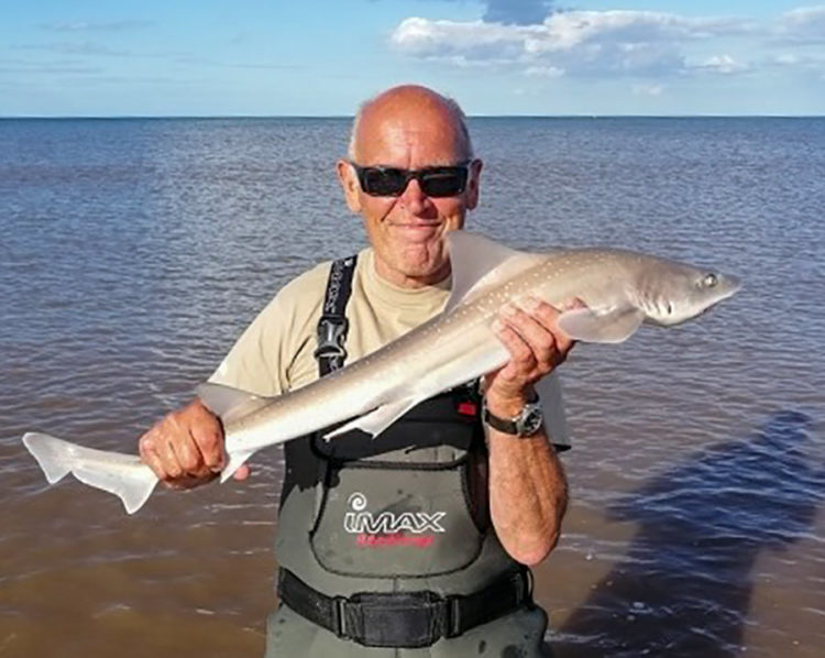 Sixth placed Chas Tibble with guess what - another hound!