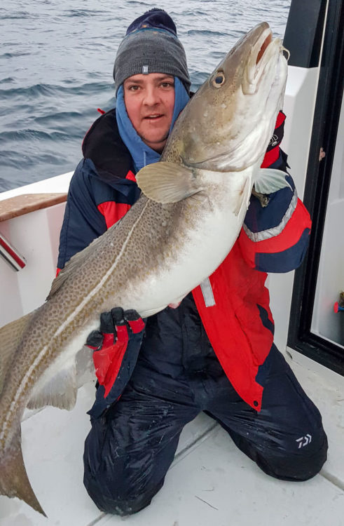 Liam Batt and his pb 34lb cod while cod fishing in Norway