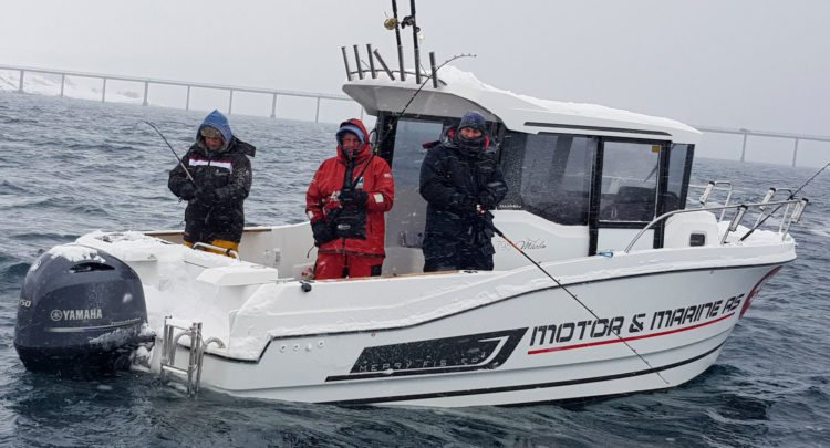 Nigel, James and Martin fishing in a blizzard