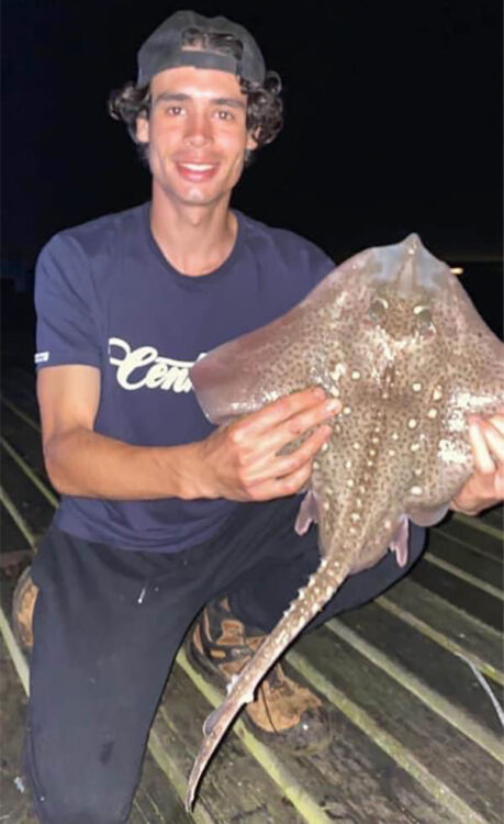 Sam Kennard looks very pleased with his thornback ray 