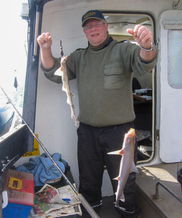 Skipper Colin with a dog and hound double shot