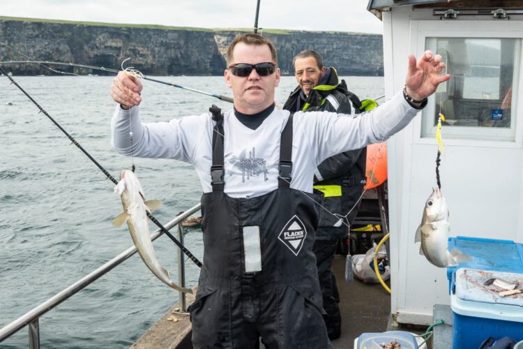 Colin with a nice whiting and haddie